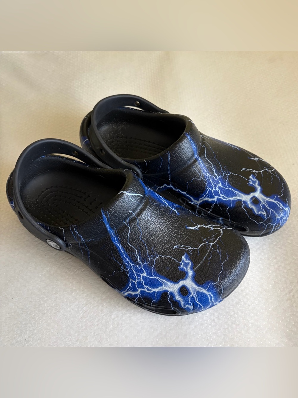 CROCS Black Clogs with Blue Lightning Print M6 - W8